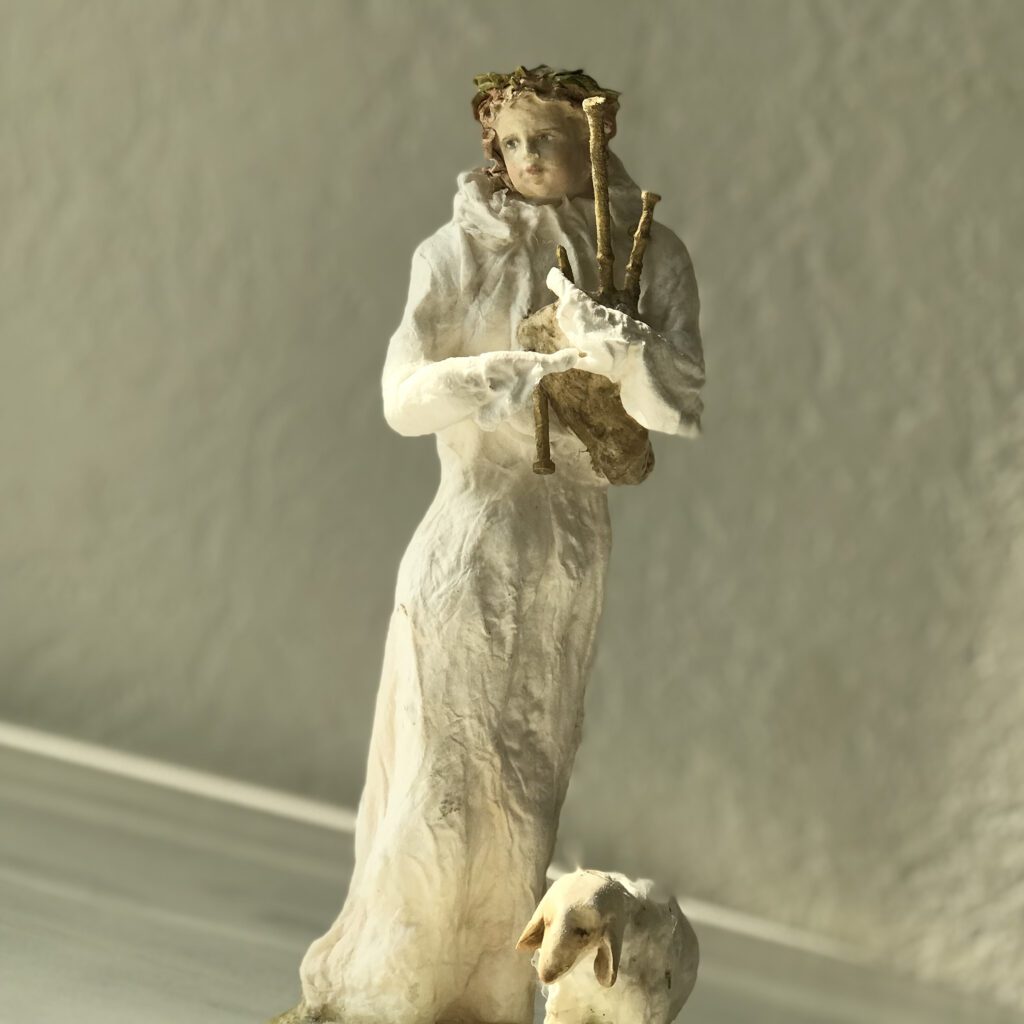 The shepherd with his sheep