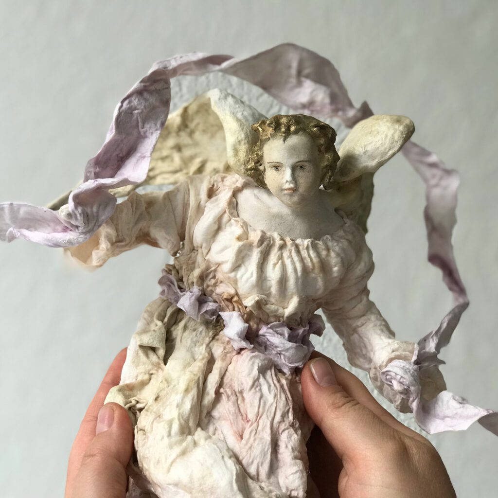 The angel, Gloria of the nativity scene