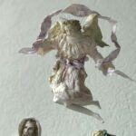 The angel, Gloria is flying above Maria and Jesus